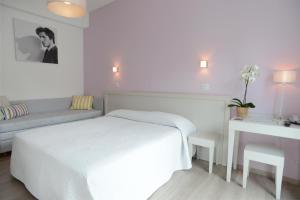 Posteľ alebo postele v izbe v ubytovaní Maree Hotel