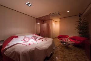 Postel nebo postele na pokoji v ubytování Hotel LUNE CLAIRE (Adult Only) + 21 fotografií