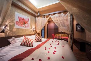 Letto o letti in una camera di Hotel LUNE CLAIRE (Adult Only)