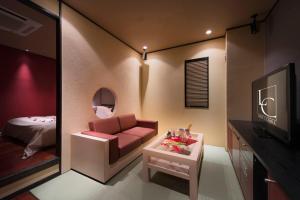 TV o dispositivi per l'intrattenimento presso Hotel LUNE CLAIRE (Adult Only)