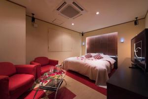 Letto o letti in una camera di Hotel LUNE CLAIRE (Adult Only)