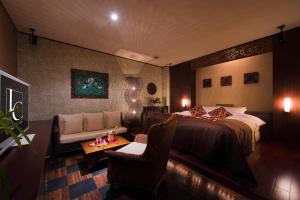 Letto o letti in una camera di Hotel LUNE CLAIRE (Adult Only)