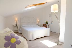 Posteľ alebo postele v izbe v ubytovaní Maree Hotel