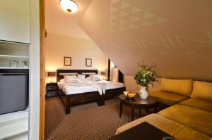 Postel nebo postele na pokoji v ubytování Hotel Annín