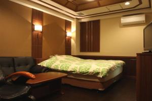 Postel nebo postele na pokoji v ubytování Hotel GOLF Atsugi (Adult Only)