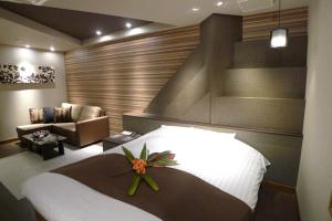 Postel nebo postele na pokoji v ubytování Hotel GOLF Nirasaki (Adult Only)
