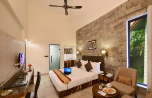Posezení v ubytování Shri Radha Brij Vasundhara Resort & Spa