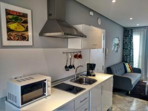 Kuchnia lub aneks kuchenny w obiekcie Apartamentos El Vestuario