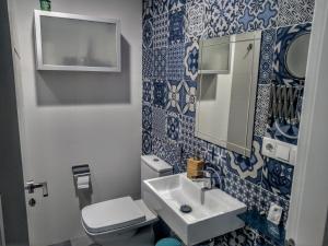 Łazienka w obiekcie Apartamentos El Vestuario