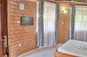 Postel nebo postele na pokoji v ubytování Itibo Resort