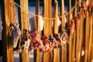 a bunch of knick knacks hanging on a fence at Ferienhaus zum Stubaier Gletscher - Dorf in Neustift im Stubaital