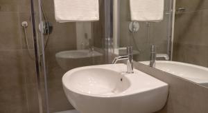 Koupelna v ubytování Garda Rooms