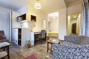 Kuchyň nebo kuchyňský kout v ubytování Ranikunj Boutique Hotel