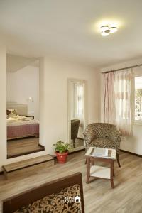 Postel nebo postele na pokoji v ubytování Ranikunj Boutique Hotel