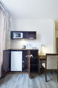 Kuchyň nebo kuchyňský kout v ubytování Ranikunj Boutique Hotel