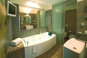 Ванная комната в Hotel Premier & Suites - Premier Resort