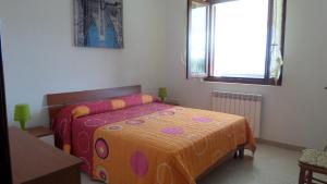 Postel nebo postele na pokoji v ubytování B&B La Posada Stintino