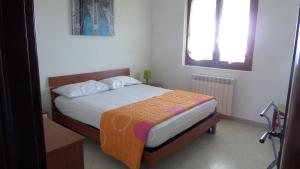 Postel nebo postele na pokoji v ubytování B&B La Posada Stintino