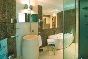 Ванная комната в Hotel Premier & Suites - Premier Resort