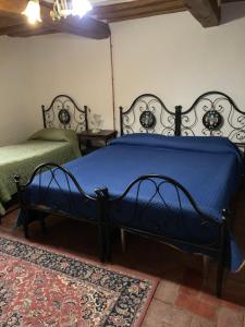 A bed or beds in a room at San Martino Vald'Afra