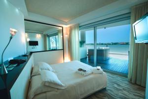 Кровать или кровати в номере Hotel Premier & Suites - Premier Resort
