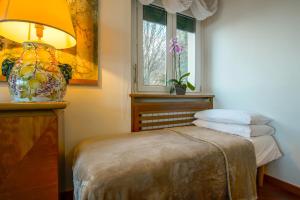 Posteľ alebo postele v izbe v ubytovaní Sana Luxury Apartment