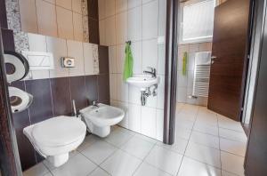 Koupelna v ubytování WX Hotel