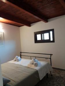Säng eller sängar i ett rum på Casale in villa tipica Salentina con Piscina