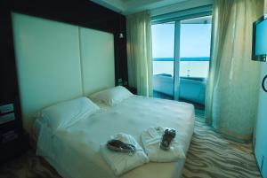 Кровать или кровати в номере Hotel Premier & Suites - Premier Resort