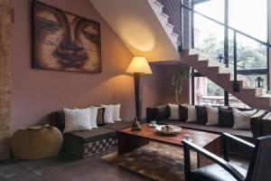 Posezení v ubytování Hotel restaurant Spa Disini Montpellier Est, The Originals Relais