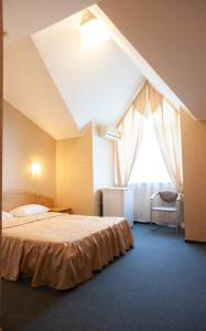 Postel nebo postele na pokoji v ubytování Almira Orion Group Hotel