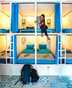 Letto o letti in una camera di Pillow Inn Ubud
