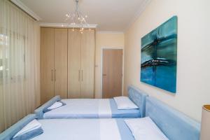 Cama o camas de una habitación en Amadora Luxury Villas