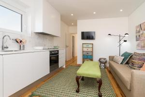 A cozinha ou kitchenette de Graça Riverview Terrace Apartment