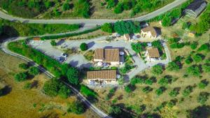 an overhead view of a house with a road at Cuore Della Valle in Cefalù