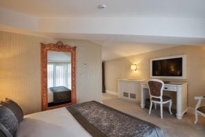 Postel nebo postele na pokoji v ubytování Ottoman's Life Hotel Deluxe