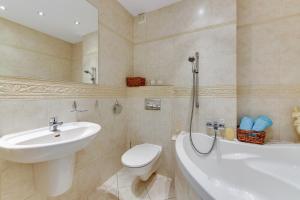Kúpeľňa v ubytovaní Apartament Stylowy + 10 fotografií