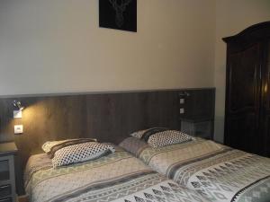 Postel nebo postele na pokoji v ubytování Hotel Valérie
