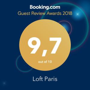 Loft Paris في نيتيروي: a sign that reads guest review awards lotants