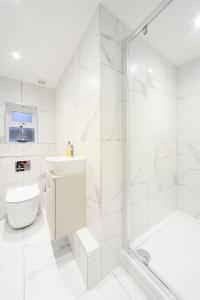 Ванна кімната в Amazing Apartment near Bournemouth, Poole & Sandbanks - WiFi & Smart TV - Newly Renovated! Great Location!
