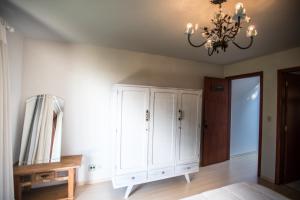 Postel nebo postele na pokoji v ubytování Bosque Oriri