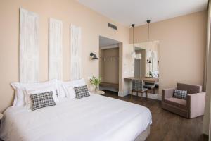 Cama ou camas em um quarto em Casa das Muralhas