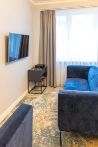 Telewizja i/lub zestaw kina domowego w obiekcie Fabulous apartment in heart of Katowice