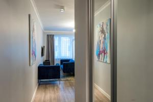 Telewizja i/lub zestaw kina domowego w obiekcie Fabulous apartment in heart of Katowice