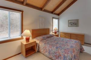 מיטה או מיטות בחדר ב-Chalet High by Capital Vacations