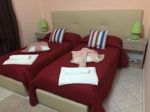 A bed or beds in a room at AFFITTACAMERE Il Cortile