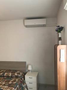 Postel nebo postele na pokoji v ubytování Casa Miki