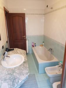 Koupelna v ubytování Casa Elisena