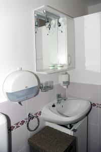 Kúpeľňa v ubytovaní Arany Szőlő Wellness Apartmanház