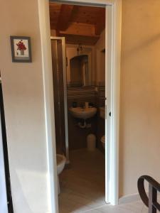 a bathroom with a toilet and a sink at Mansarda 5 terre in Monterosso al Mare